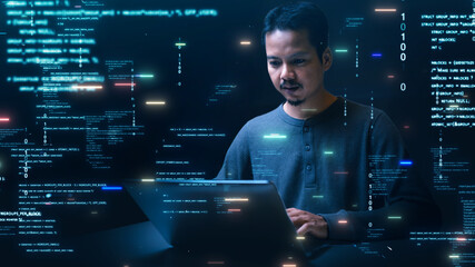 An Asian software developer works intently on a laptop, surrounded by glowing digital code, binary...