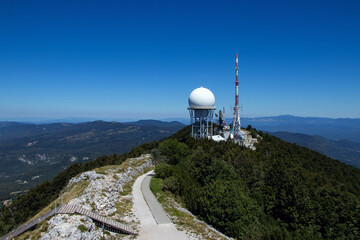 telecommunication tower in the mountains, Ucka, Vojak, Croatia above the Adriatic sea