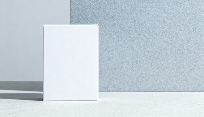 Elegant White Box Mockup Display on Minimalist Light Gray Background, Ideal for Product Showcase