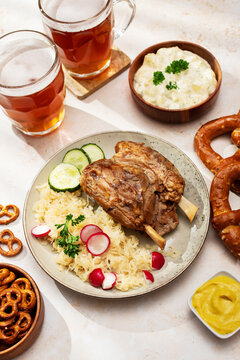 Festive German Oktoberfest table with traditional food