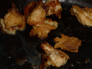Crispy Fried Pork Fat on Black Pan