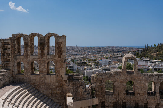 View of Athens through Odeon of Herodes Atticus ruins