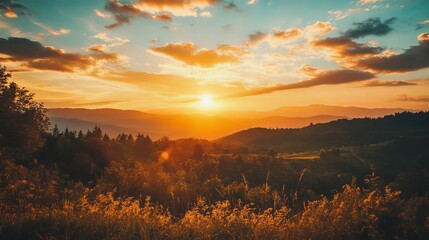 Fototapeta premium Golden sunset over mountain range