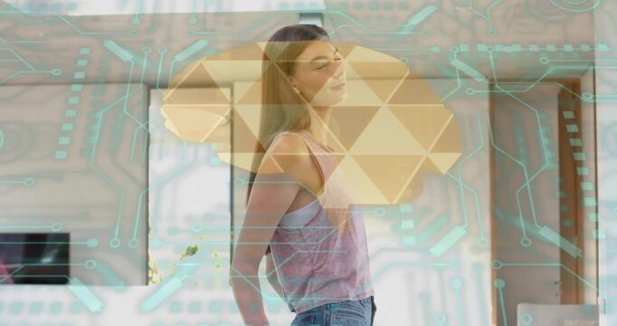 Golden hologram appearing in living room showcasing tech engaging woman turning head brushing hair