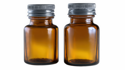 Amber glass bottles with silver caps upright on black