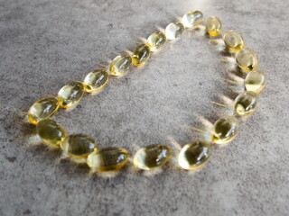 Vitamin D3 capsules arranged in a 