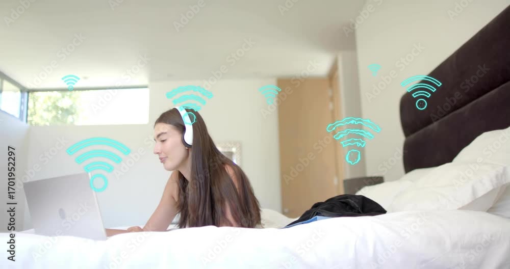 Poster tech user typing on laptop causing turquoise wi-fi icons emerging illustrating strong connectivity