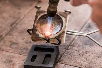torch melting gold for jewelry