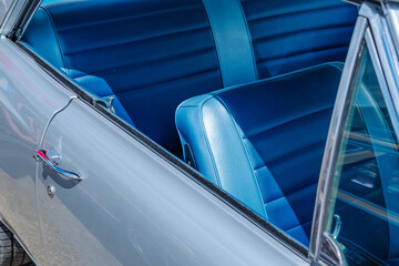 Cars show classic car detail shot, blue interior, background image, hobbies car culture