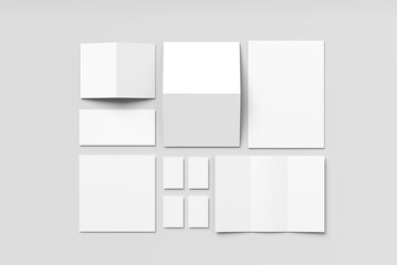 Array of blank stationery items arranged on a light gray background. 