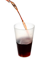 Pouring a glass of juice isolated