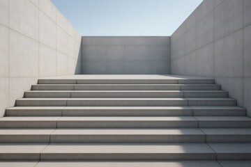 Wide concrete staircase leading to an empty platform between two high concrete walls under a clear blue sky