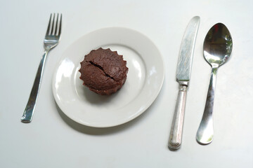 Muffin chocolate cake on a plate