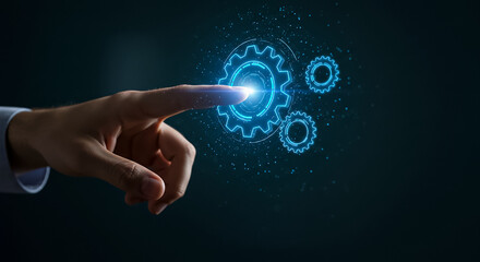 Activating futuristic technology a finger touches a glowing digital cog initiating progress and