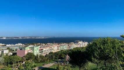 Seaside panorama with vivid rooftops and azure horizons, perfect for Dia de Portugal or coastal urban planning inspirations
