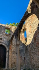 Sunlit ruins of ancient stone arches whisper tales of forgotten solstice rituals, echoing Medieval Day and Heritage Treasures celebrations