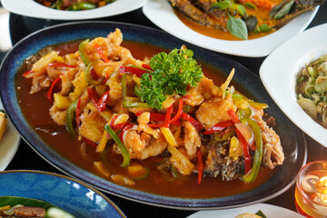 Sweet and Sour Gurame, captured on September 13, 2025. Indonesian fried gourami fish served with tangy sweet and sour sauce, colorful garnish, and authentic culinary presentation