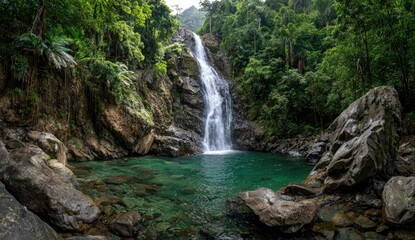 Naklejka premium Lush waterfall cascading into a tranquil pool (12)