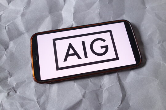 Konskie, Poland - September 13, 2025: American International Group company logo displayed on mobile phone