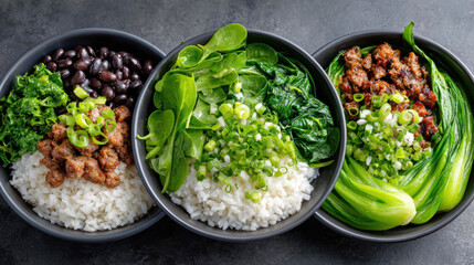 Bowls of rice with greens and meat toppings arranged aesthetically.