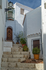 Fototapeta premium Streets in Frigiliana, typical Andalusian village with white houses, Spain