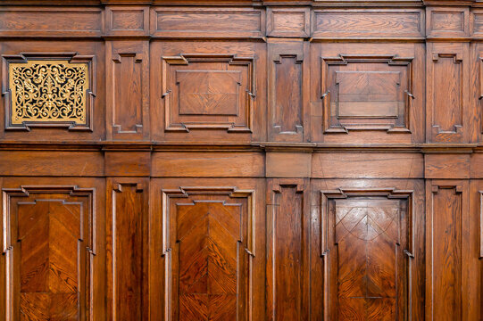 Antique old retro wooden decorative panel with vintage golden frames.