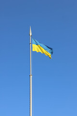 Flag of Ukraine on a flagpole. High quality photo