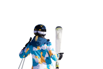 Girl skier in equipment with skis looking forward isolated on transparent background. Design element for winter sport, resort, vacation. PNG