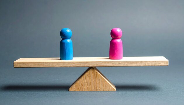 Pink and blue figurines balanced on wooden seesaw over triangular fulcrum.