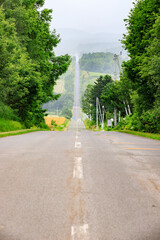 The Roller Coaster Road, Long Straight Road Through Countryside Hills in Biei, Hokkaido, Japan