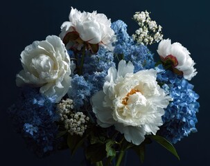Still life of white peonies and blue hydrangeas