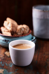 Cup of coffee on rustic wooden background. Soft focus. Copy space	