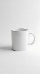Fototapeta premium Plain White Ceramic Mug with Handle on a Bright Studio Background