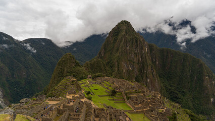 Mysterious Machu Picchu, the Lost City of the Incas, under a cloudy sky