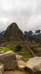Mysterious Machu Picchu, the Lost City of the Incas, under a cloudy sky