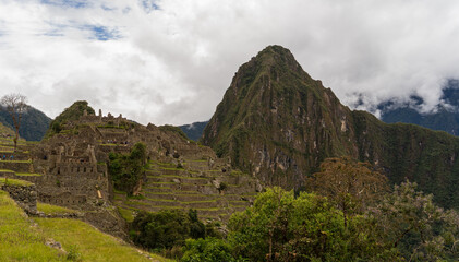 Mysterious Machu Picchu, the Lost City of the Incas, under a cloudy sky