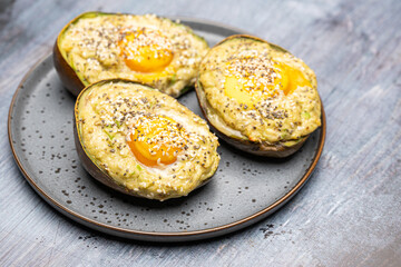 Close Up of Baked Avocado Egg with Chia and Sesame Seeds