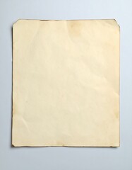 Obraz premium Aged, blank sheet of paper, creased edges, light beige