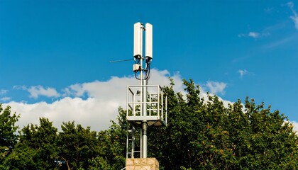 Outdoor telecommunications tower against a blue sky