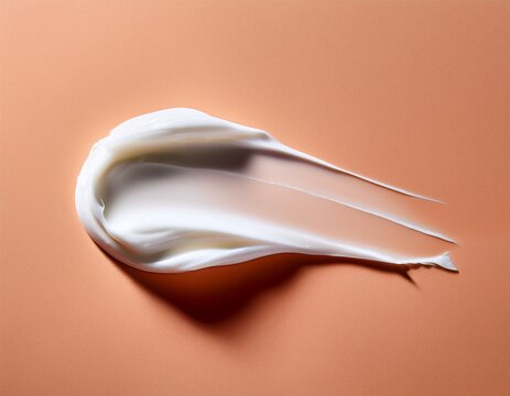 white cream smear on peach background - Powered by Adobe