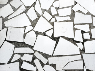 beautiful colorful mosaic floor made of broken ceramic tiles with abstract patterns. Ideal for texture background, recycled art, tile design, and creative surface concept.