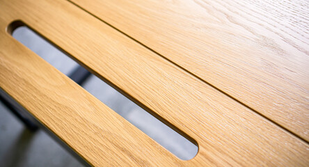 Empty rough wooden table top in the dark room
