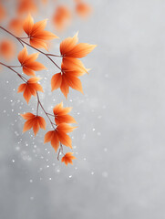 Delicate orange autumn leaves on dark branches with light specks for design card