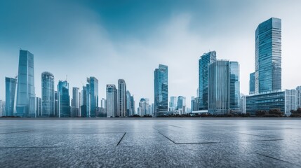 Obraz premium Modern Cityscape Skyline with Contemporary Architecture and Urban Infrastructure Against a Clear Blue Sky