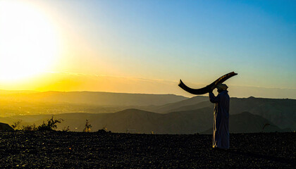 Fototapeta premium Shofar Horn Silhouette with Golden Backlight. Yom Kippur concept. Generated Image