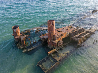 Aerial landscape of wrecked boat Mediterranean Sea sunset at shipwreck beach Thessaloniki