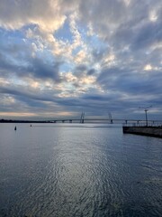 View of the bay with bridges and embankment on a good day vertical lifestyle
