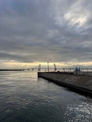 View of the bay with bridges and embankment on a good day vertical lifestyle