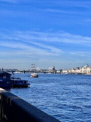 View of the bay with bridges and embankment on a good day vertical lifestyle