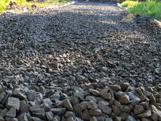 Gravel Path Being Constructed in a Lush Outdoor Area